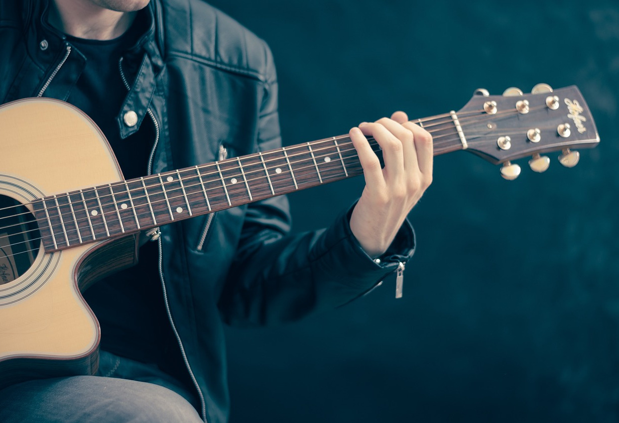 guitar repair closeup fretboard